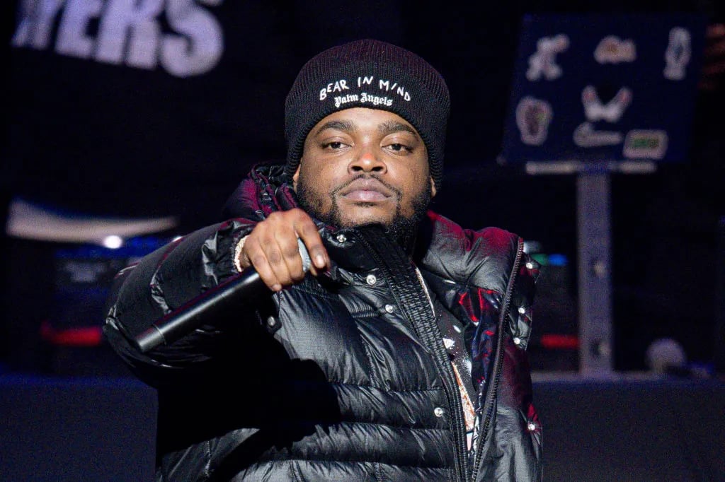 Bossman Dlow performs on stage