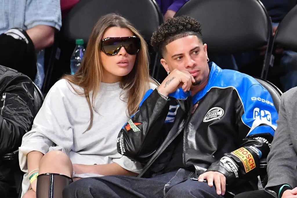 LOS ANGELES, CALIFORNIA - MARCH 06: Austin McBroom (R) and a guest attend a basketball game between the Los Angeles Lakers and the New York Knicks at Crypto.com Arena on March 06, 2025 in Los Angeles, California. NOTE TO USER: User expressly acknowledges and agrees that, by downloading and or using this photograph, User is consenting to the terms and conditions of the Getty Images License Agreement.