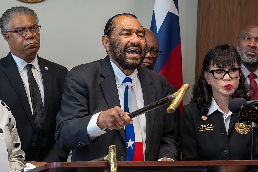 HOUSTON, TEXAS - APRIL 22: U.S. Rep. Al Green refers to comments made by U.S. Rep. Diana Harshbarge as he waves his walking cane during a press conference in Houston, Tuesday, April 22, 2025