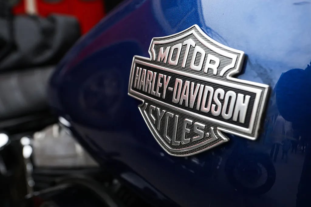 ST PETERSBURG, RUSSIA - 2025/05/18: Harley Davidson logo seen on a motorcycle during the general motorcycle race. A Distinguished Gentleman's Ride was held in St. Petersburg, joining a global motorcycle event that raises funds and awareness for prostate cancer research and men's mental health through the Movember Foundation. Originating in Australia in 2011, the ride now spans 56 countries. Participants follow a strict dress code: classic suits for men, dresses for women, and ride only vintage or retro-style motorcycles. (