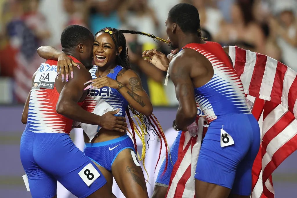 BUDAPEST, HUNGARY - AUGUST 26: Sha'Carri Richardson of Team United States celebrates with Christian Coleman, Noah Lyles and Fred Kerley after winning the Women's 4x100m Relay Final during day eight of the World Athletics Championships Budapest 2023 at National Athletics Centre on August 26, 2023 in Budapest, Hungary.