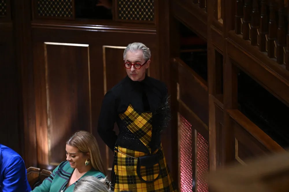 THE TRAITORS -- "Revenge Is A Dish Best Served Cold" Episode 302 -- Pictured: (l-r) Robyn Dixon, Alan Cumming -- (