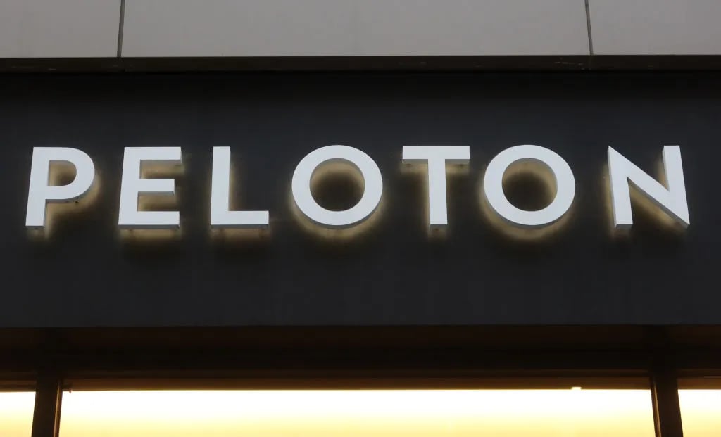 LOS ANGELES, CA - APRIL 10: A Peloton corporate logo hangs on the front of their store in Santa Monica on April 10, 2023, in Los Angeles, California.