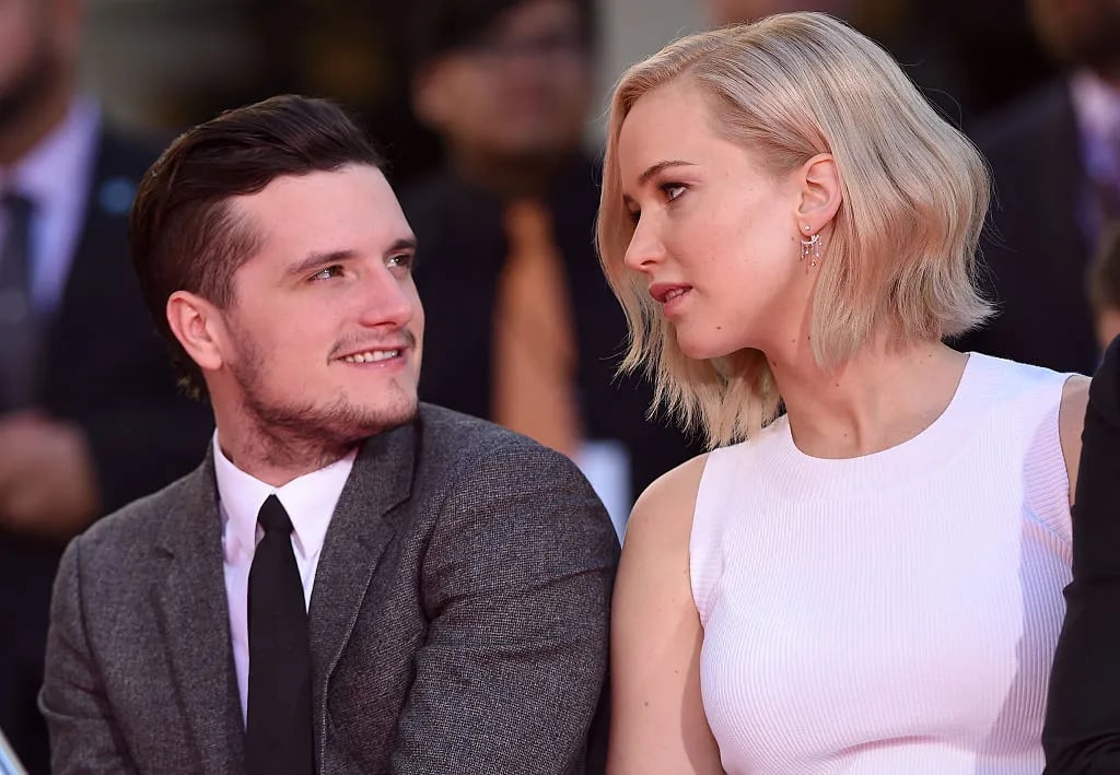 HOLLYWOOD, CA - OCTOBER 31: Actors Josh Hutcherson and Jennifer Lawrence pose at 'The Hunger Games: Mockingjay - Part 2' Hand And Footprint Ceremony at TCL Chinese Theatre on October 31, 2015 in Hollywood, California.