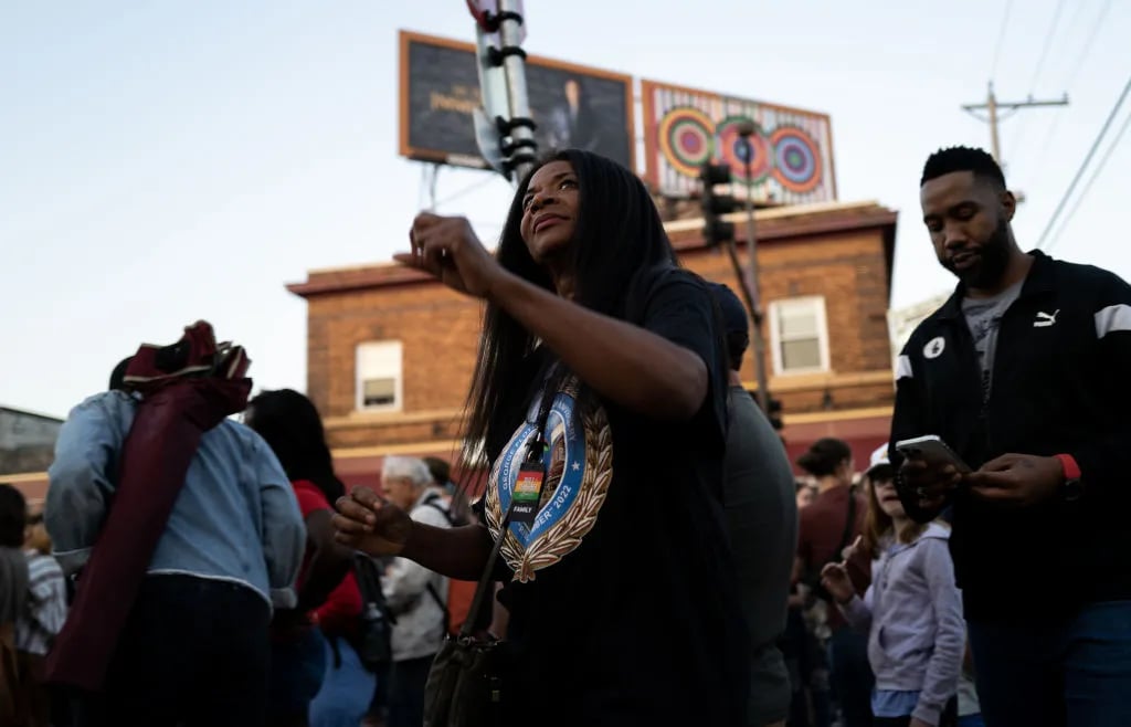 MINNEAPOLIS, MINNESOTA - MAY 25: Angela Harrelson (C), aunt of George Floyd, arrives for a vigil at George Floyd Square on May 25, 2023 in Minneapolis, Minnesota. Today marks three years since Floyd was killed in 2020 by a Minneapolis police officer who was found guilty of second-degree murder.