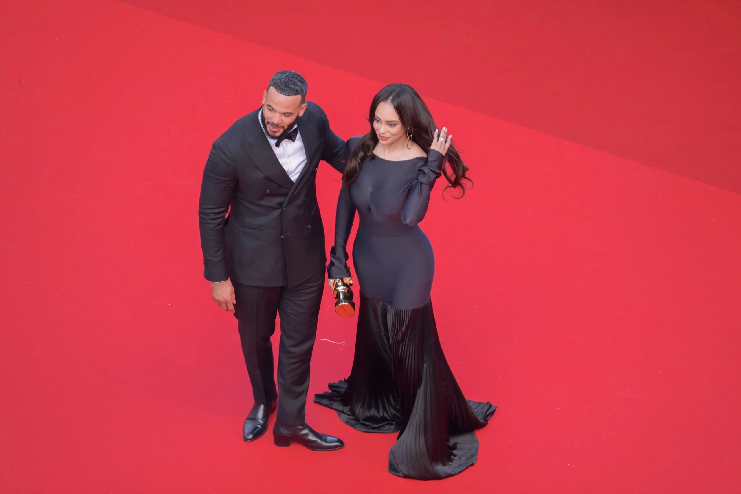 CANNES, FRANCE - MAY 16: Kristy Sarah Scott and Desmond Scott attend the "Megalopolis" Red Carpet at the 77th annual Cannes Film Festival at Palais des Festivals on May 16, 2024 in Cannes, France.