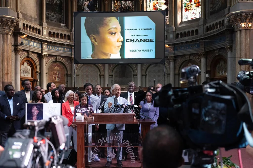 CHICAGO, ILLINOIS - JULY 30: The Rev. Al Sharpton speaks alongside family members of Sonya Massey during a press conference at New Mount Pilgrim Church on July 30, 2024 in Chicago, Illinois. Massey was shot and killed in her home by Sangamon County Sheriff's Deputy Sean Grayson after she called police to report a possible prowler. Grayson, 30, who has since been fired by the department, was indicted by an Illinois grand jury. He has pleaded not guilty to charges of first-degree murder, aggravated battery with a firearm and official misconduct.