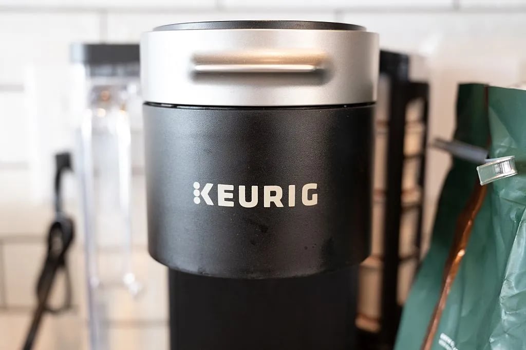 Close-up of Keurig logo on coffee maker, Murphys, California, August 3, 2025. (Photo by Smith Collection/Gado/Getty Images)