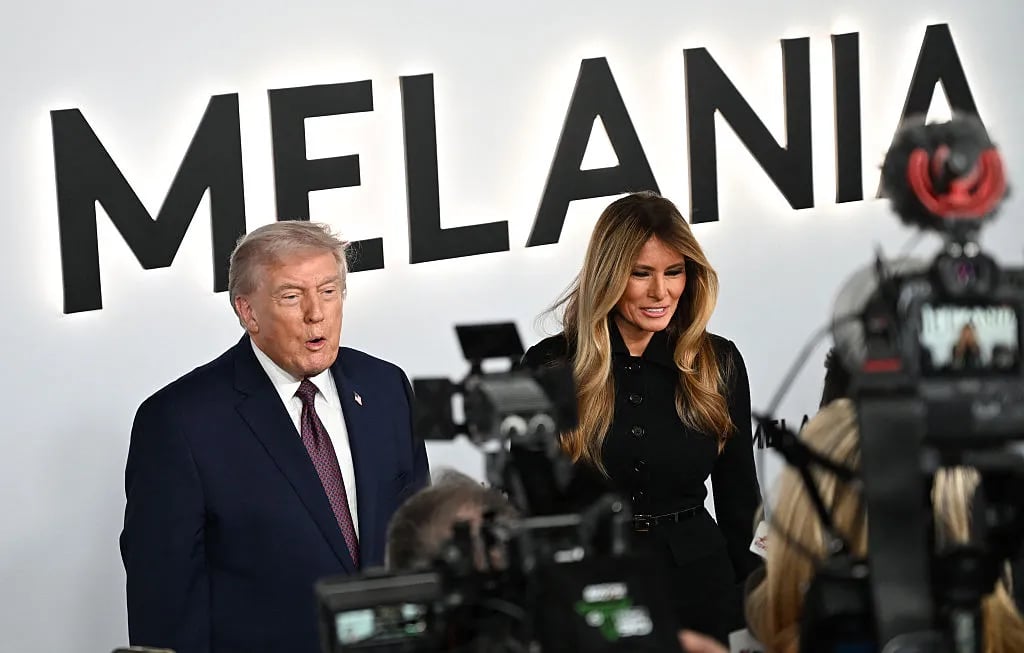 US President Donald Trump and US First Lady Melania Trump speak to journalists as they attend the world premiere of Amazon MGM Studios' "Melania" at the Kennedy Center in Washington, DC, on January 29, 2026.