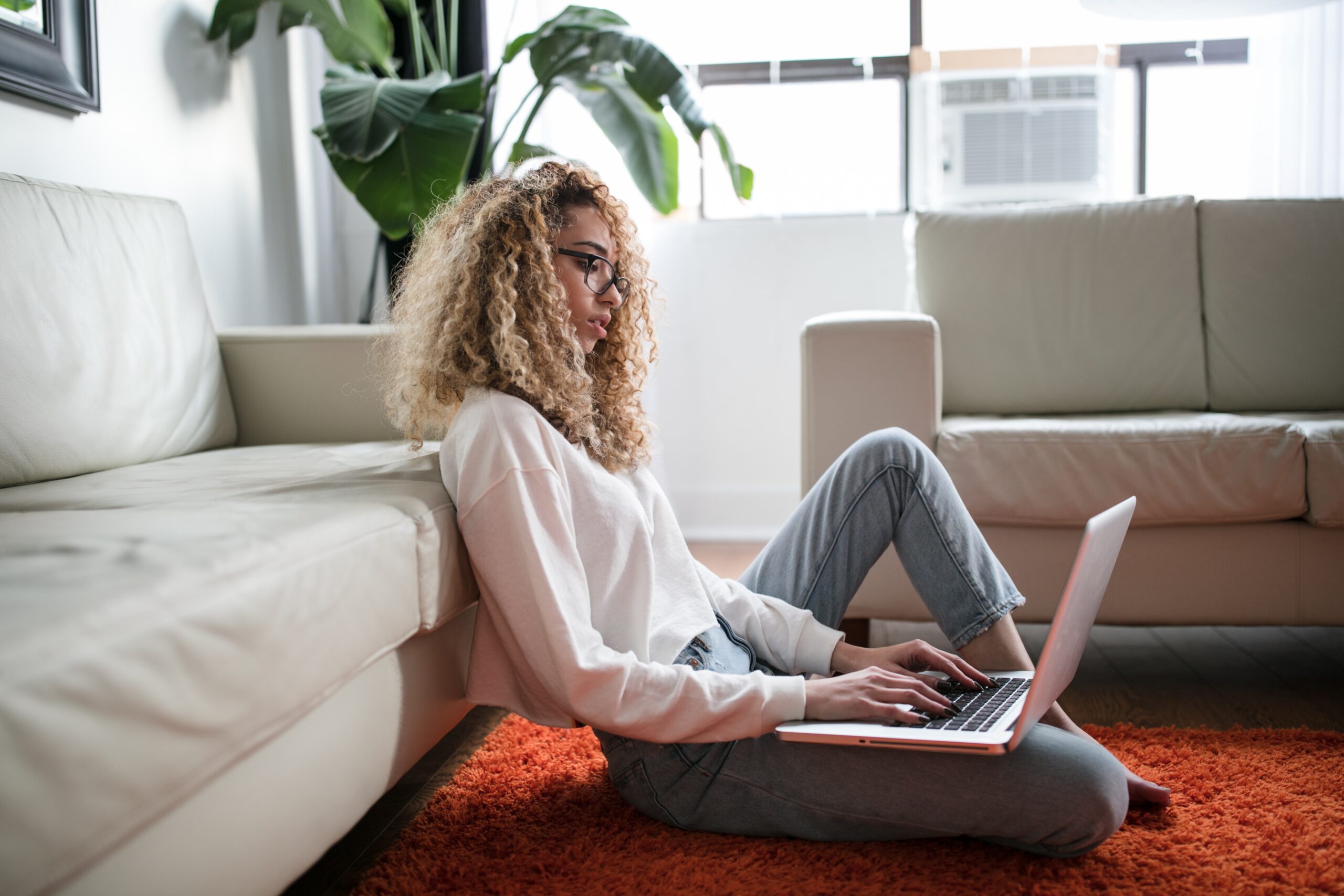 how to see who blocked you on Instagram using three easy methods. pictured: black girl on computer.