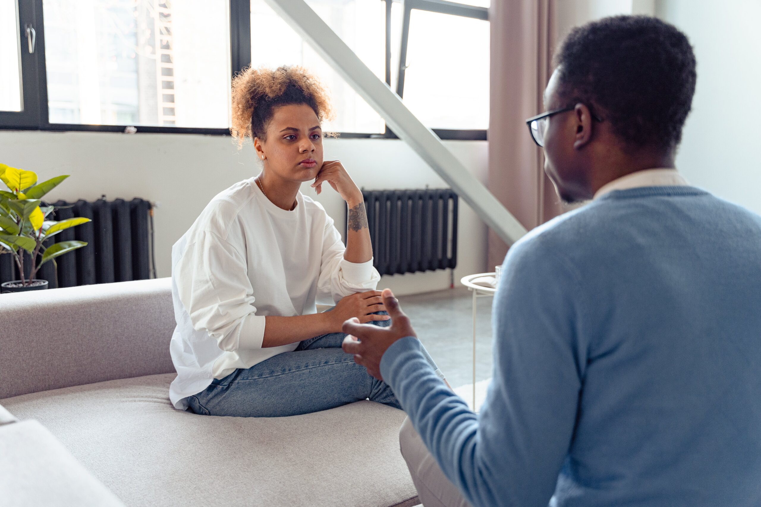 Are you in a tumultuous relationship, look here for some help? Pictured: a Black couple arguing.