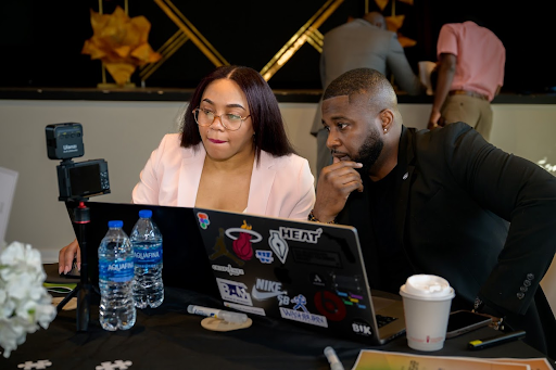 couple sitting at computer working together