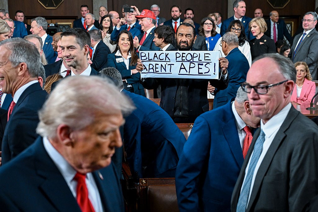 WASHINGTON, DC - FEBRUARY 24: U.S. Rep. Al Green (D-TX) protests as President Donald Trump arrives to deliver the State of the Union address during a joint session of Congress at the Capitol on February 24, 2026 in Washington, DC. Trump delivered his address days after the Supreme Court struck down the administration's tariff strategy, and amid a U.S. military buildup in the Persian Gulf threatening Iran.