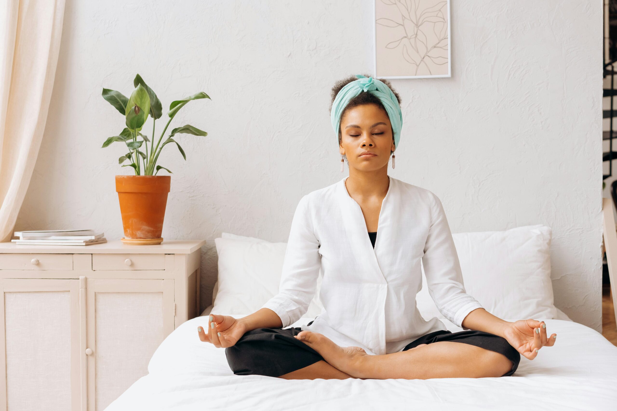 Black Woman in White Long Sleeve Shirt Meditating