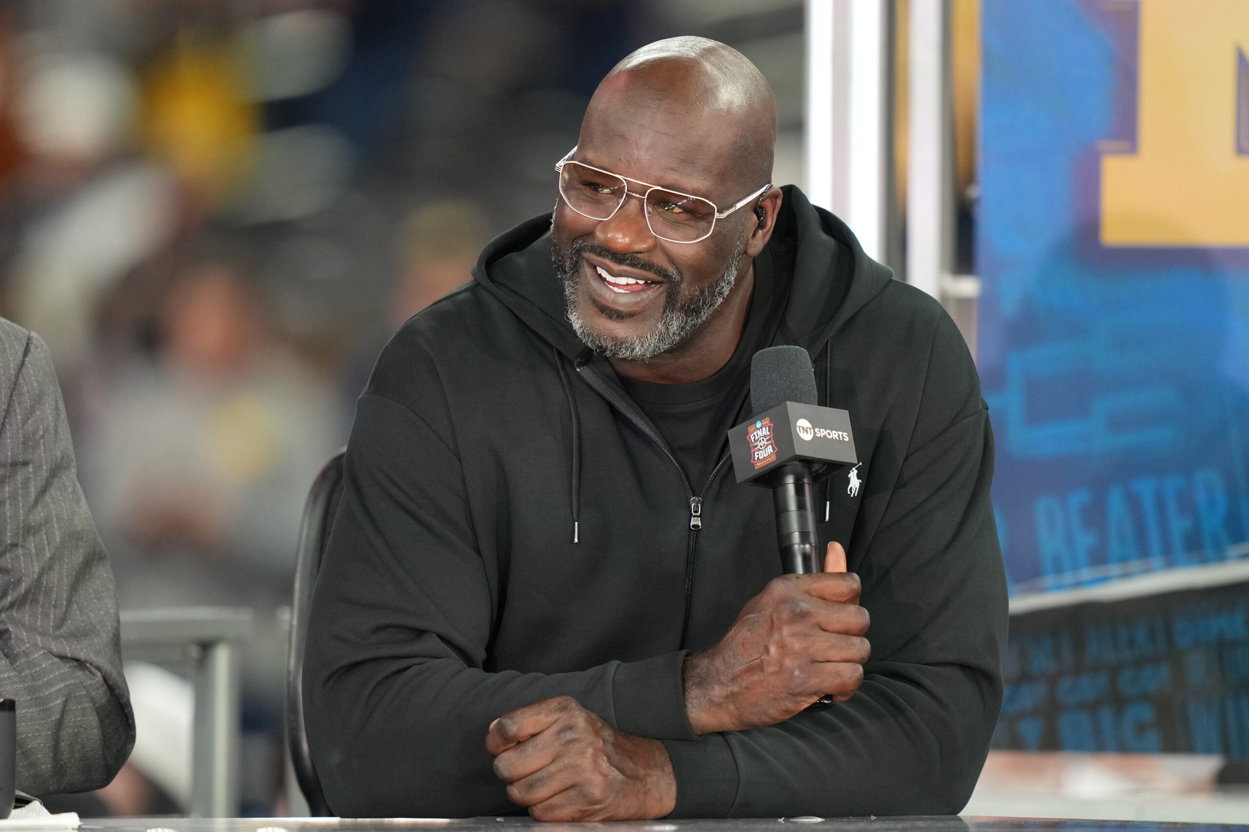 Former basketball player Shaquille O'Neal on air before the National Championship of the 2026 NCAA Men's Basketball Tournament between the Michigan Wolverines and the Connecticut Huskies at Lucas Oil Stadium on April 06, 2026 in Indianapolis, Indiana.
