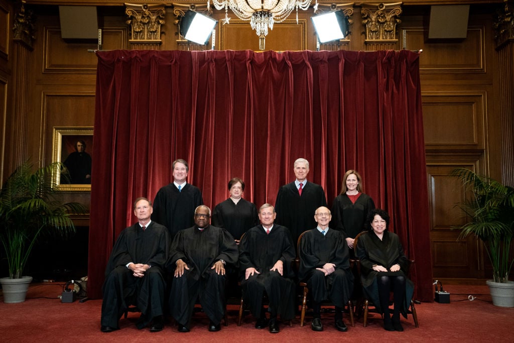 Members of the Supreme Court pose for a group photo at the Supreme Court in Washington, DC on April 23, 2021. Seated from left: Associate Justice Samuel Alito, Associate Justice Clarence Thomas, Chief Justice John Roberts, Associate Justice Stephen Breyer and Associate Justice Sonia Sotomayor, Standing from left: Associate Justice Brett Kavanaugh, Associate Justice Elena Kagan, Associate Justice Neil Gorsuch and Associate Justice Amy Coney Barrett.