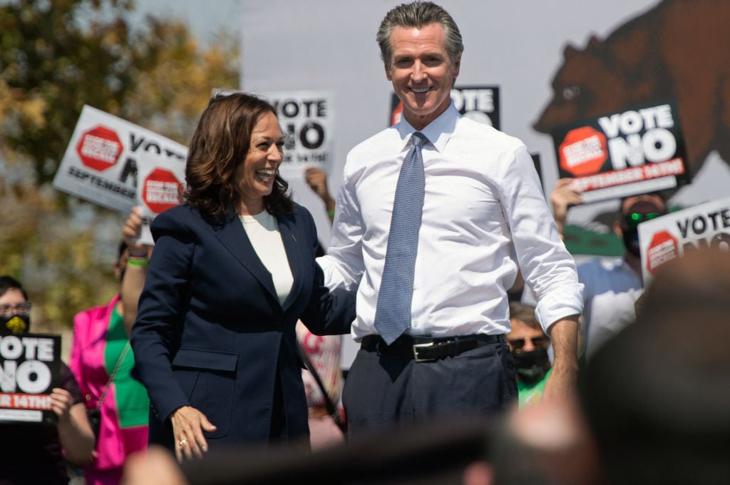 US Vice President Kamala Harris (L) stands with California Governor Gavin Newsom during a campaign event against his recall election at the IBEW-NECA Joint Apprenticeship Training Center in San Leandro, California, September 8, 2021. (Photo