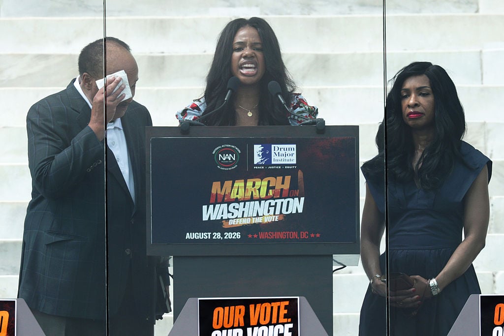 Yolanda Renee King (C) speaks alongside her parents, Martin Luther King III (L) and Arndrea Waters King during a "Defend the Vote" rally marking the 63rd anniversary of the 1963 March on Washington on the National Mall on August 28, 2026 in Washington, DC. Thousands of demonstrators are expected to gather for the 2026 March on Washington to defend voting rights and mark the anniversary of Rev. Martin Luther King Jr.’s historic 1963 march.