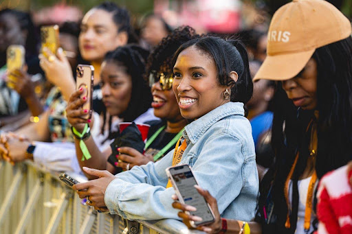 Attendees at the Blavity House Party Block Party during AfroTech 2025.