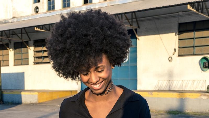 Corporations Are Repaying Black Essential Workers By Discriminating Against Their Natural Hair