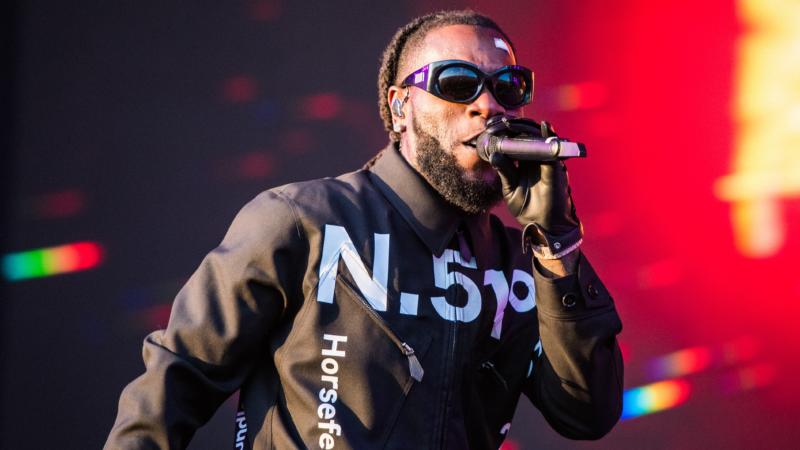 Burna Boy References Malcolm X, Louis Farrakhan After Making Controversial Statements About Black Americans Not Knowing Their Roots
