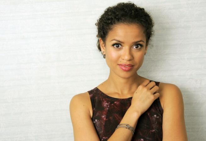 British actress Gugu Mbatha-Raw, star of the film "Belle," poses for a portrait on day 5 of the 2013 Toronto International Film Festival on Monday, Sept. 9, 2013 in Toronto. (Photo by Chris Pizzello/Invision/AP) ORG XMIT: TOCP112