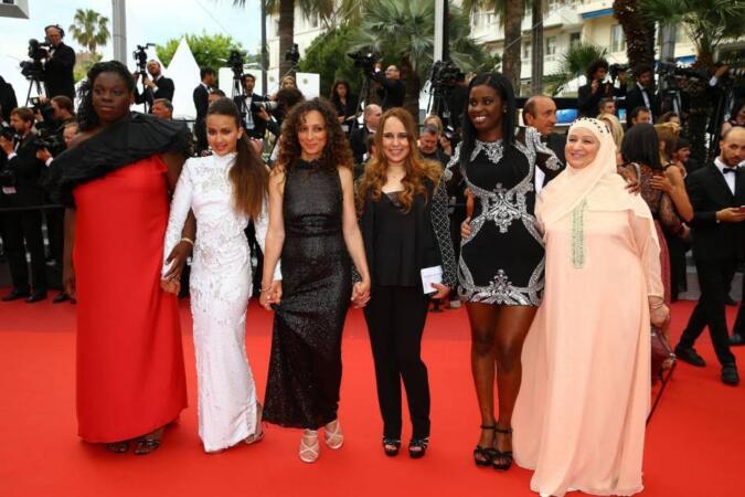 Director Houda Benyamina (3rd L) and guests attend the Closing Ceremony of the 69th annual Cannes Film Festival at the Palais des Festivals on May 22, 2016 in Cannes, France. (May 21, 2016 - Source: Neilson Barnard/Getty Images Europe) 
