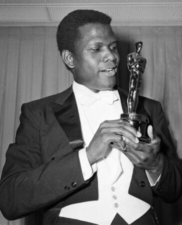 Sidney Poitier with his Oscar after he won the Academy Award for Best Actor in a Leading Role, at the Beverly Hilton Hotel in Hollywood, California, 13th April 1964. Poitier won for his performance in 'Lilies Of The Field', directed by Ralph Nelson.