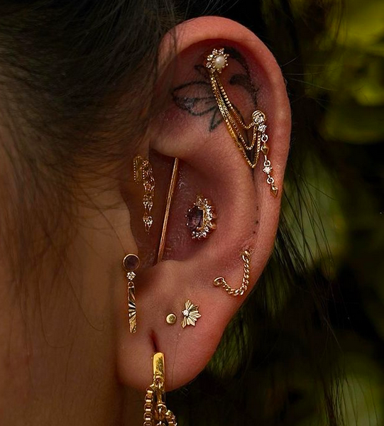 Orbital piercing on the ear.