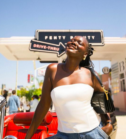 Nyma Tang, a Black YouTuber focused on beauty and Black skin.