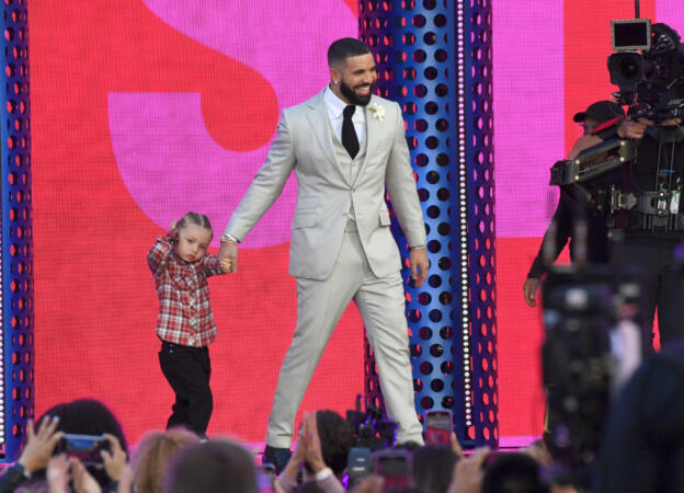 LOS ANGELES, CALIFORNIA - MAY 23: (L-R) Adonis Graham and Drake, winner of the Artist of the Decade Award, speak onstage for the 2021 Billboard Music Awards, broadcast on May 23, 2021 at Microsoft Theater in Los Angeles, California. (Photo by Kevin Mazur/Getty Images)