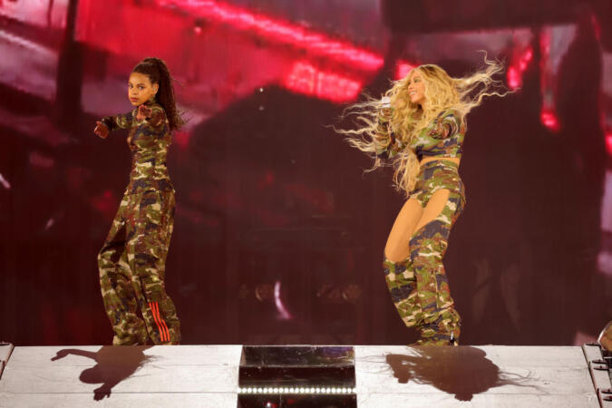 ATLANTA, GEORGIA - AUGUST 11: (EDITORIAL USE ONLY) (EXCLUSIVE COVERAGE) (L-R) Blue Ive Carter and Beyoncé perform onstage during the "RENAISSANCE WORLD TOUR" at Mercedes-Benz Stadium on August 11, 2023 in Atlanta, Georgia. (Photo by Kevin Mazur/WireImage for Parkwood)