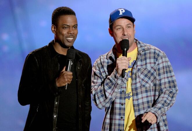 CULVER CITY, CA - APRIL 14: Actors Chris Rock (L) and Adam Sandler speak onstage during the 2013 MTV Movie Awards at Sony Pictures Studios on April 14, 2013 in Culver City, California. (Photo by Kevork Djansezian/Getty Images)
