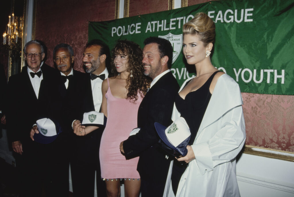 Mariah Carey 90s pictured: Mariah Carey, Tommy Mottola and others celebrating in 1991