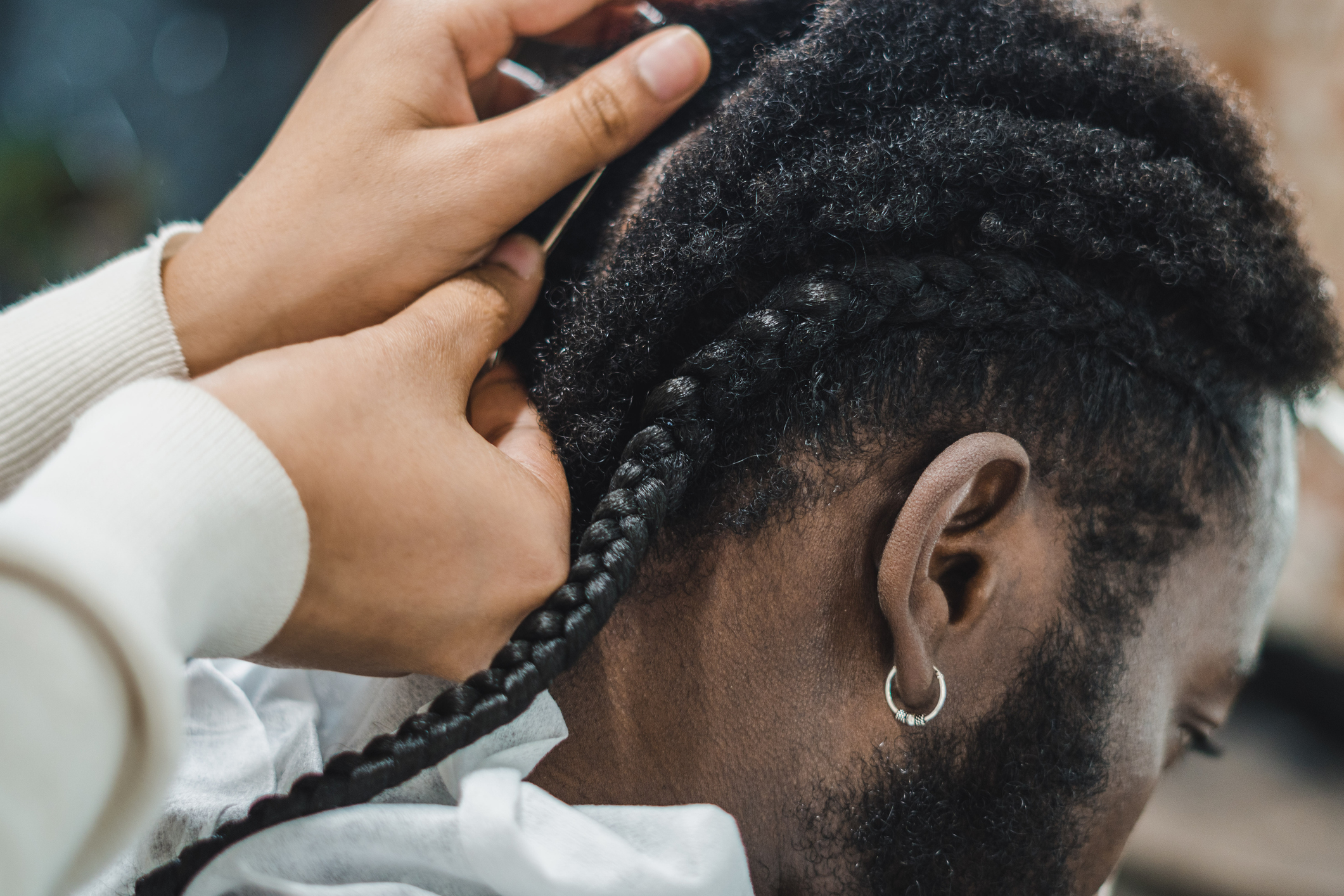 Teacher's Viral TikTok Video Showing His Students Removing His Braids In Classroom Sparks Discourse