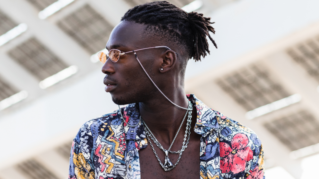 Black Man with Dreadlocks Wearing Stylish Shirt