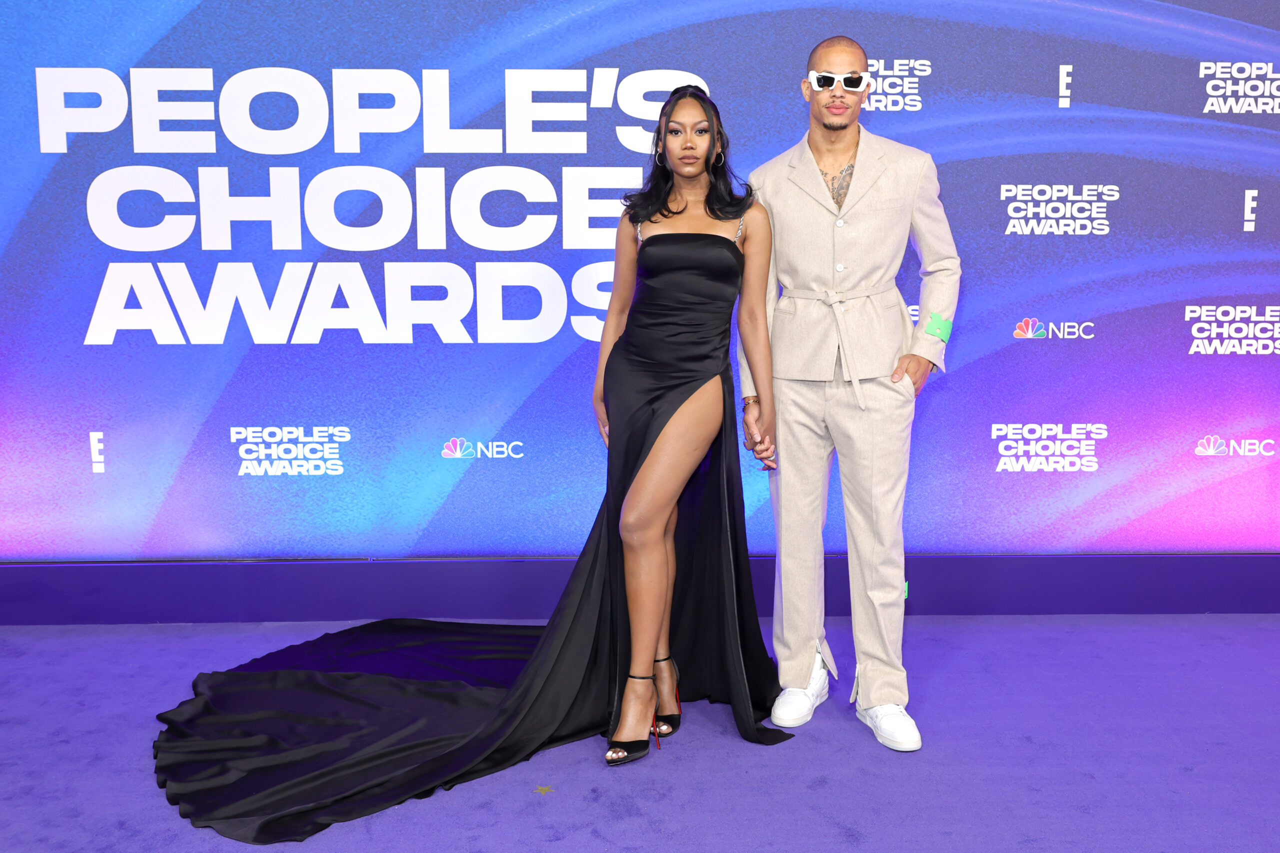 Business Partners and Lovers: Who Is Muni Long’s Husband? | SANTA MONICA, CALIFORNIA - DECEMBER 06: (L-R) Muni Long and Raysean Hairston attend the 2022 People's Choice Awards at Barker Hangar on December 06, 2022 in Santa Monica, California. (Photo by Amy Sussman/Getty Images )