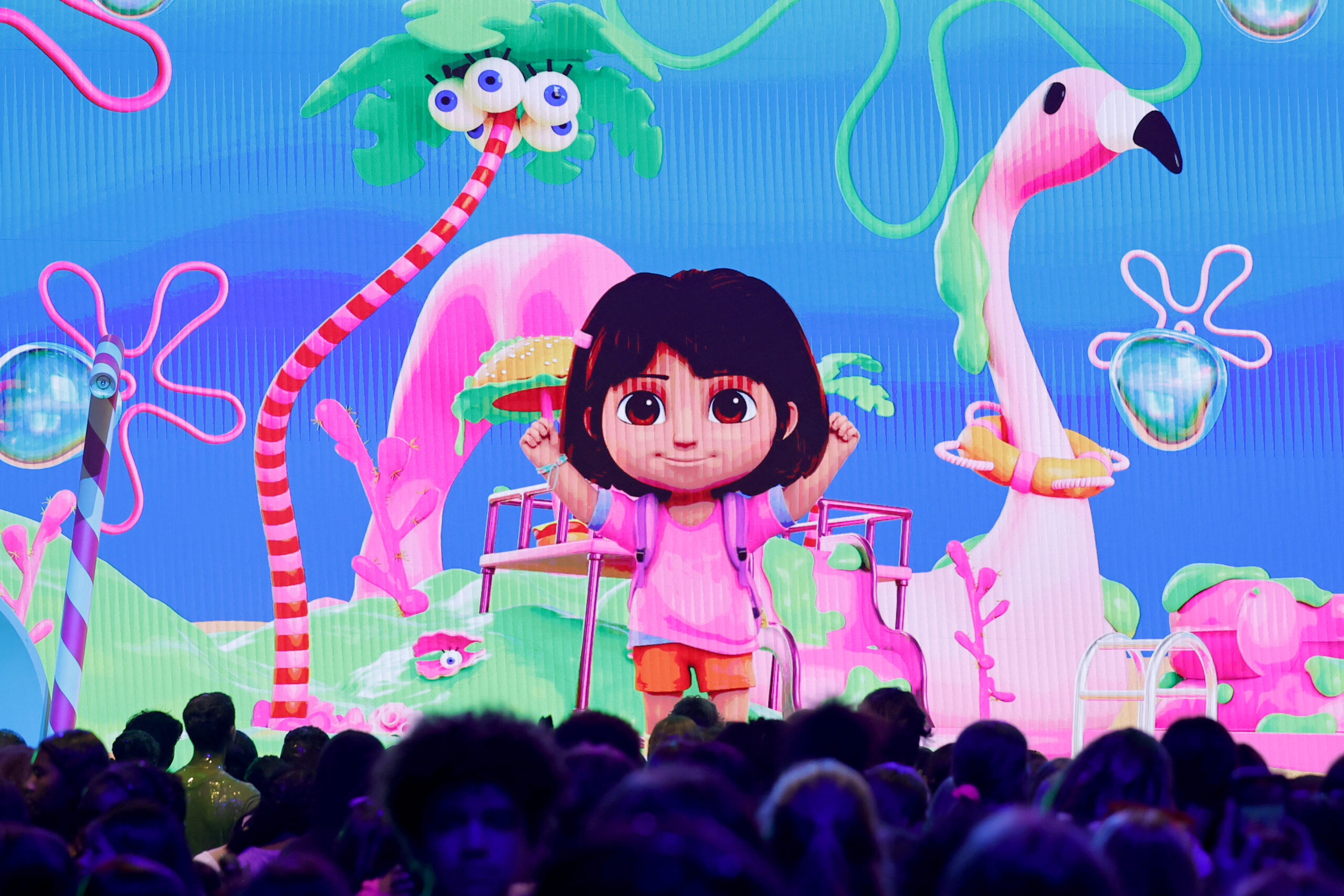 Unpacking The Mystery Behind Dora The Explorer’s Height And Age | SANTA MONICA, CALIFORNIA - JULY 13: Dora the Explorer
is seen on screen during Nickelodeon Kids' Choice Awards 2024 at Barker Hangar on July 13, 2024 in Santa Monica, California.  (Photo by Emma McIntyre/Getty Images for Nickelodeon)