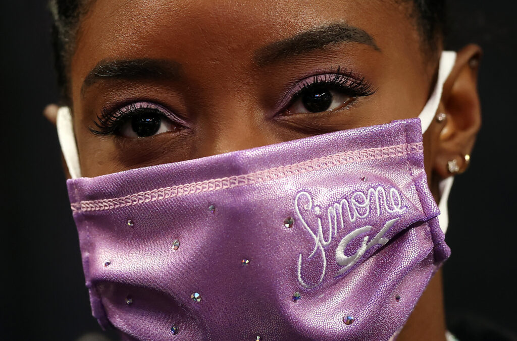 Simone Biles fashion pictured: Simone Biles matching face mask and eyeliner