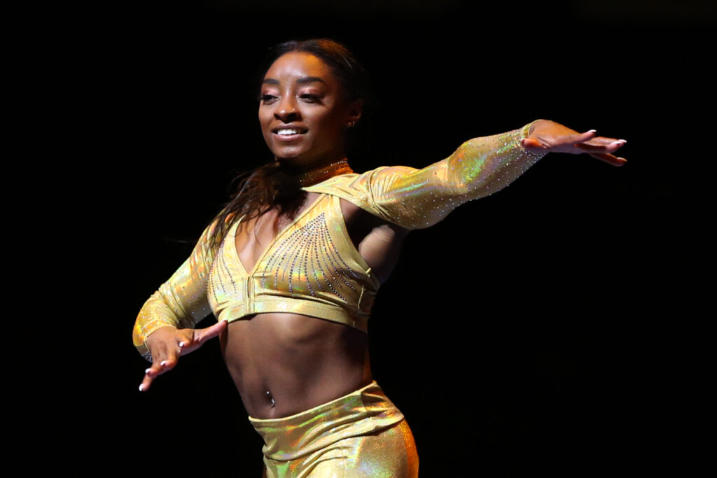 Simone Biles fashion pictured: Simone Biles performs during Gold Over America Tour