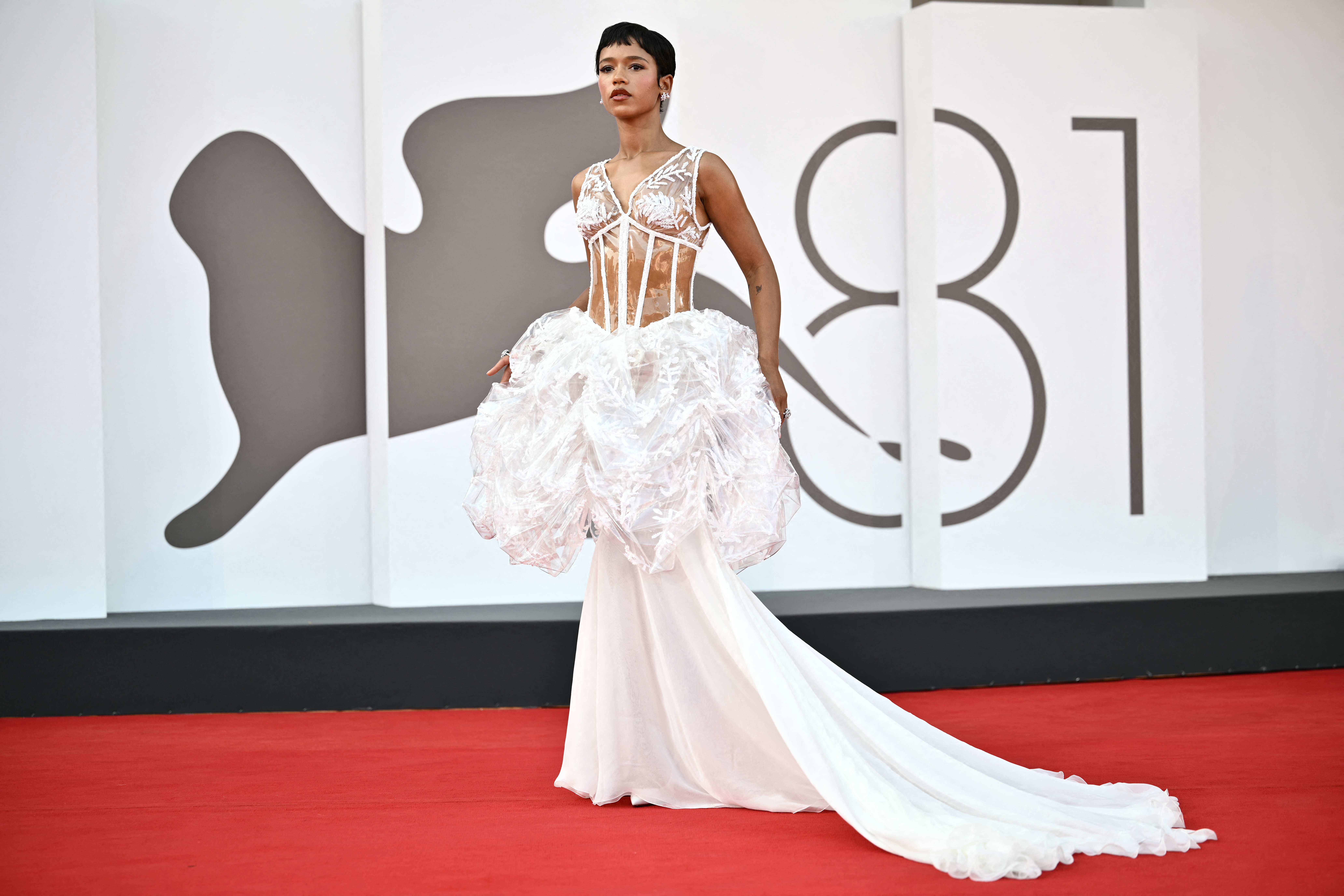 Venice Film Festival pictured: Taylor Russell on the Venice Film Festival red carpet | (Photo by MARCO BERTORELLO/AFP via Getty Images)