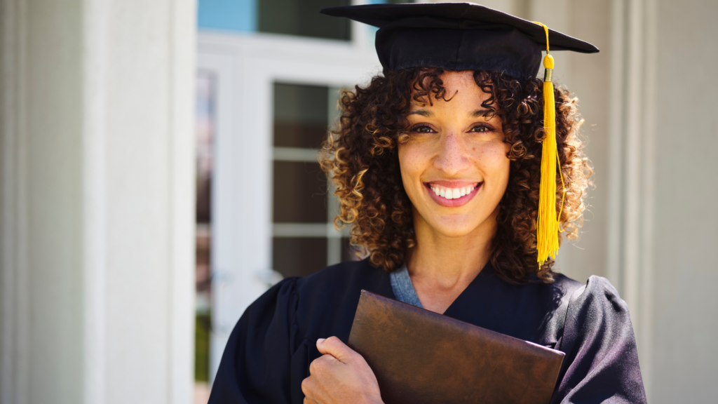 Adult Student in cap and gown at graduation