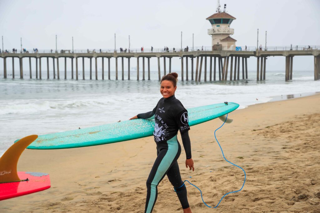 A Black woman after surfing