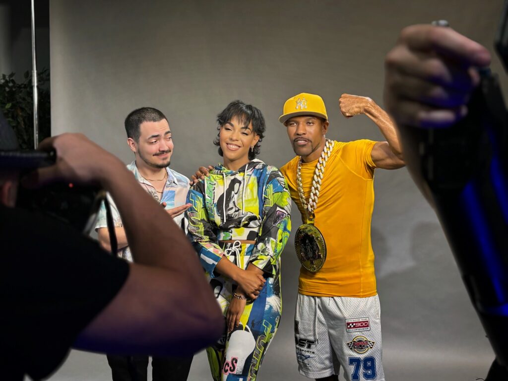 Three people smiling for the camera