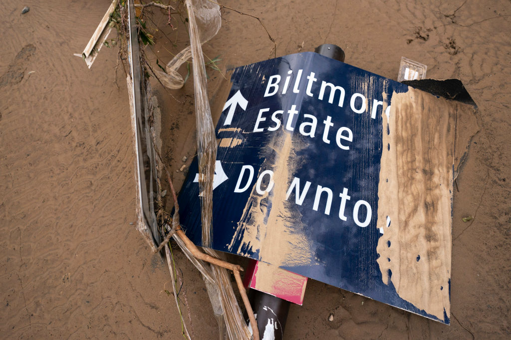  A storm damaged sign in the Biltmore Village in the aftermath of Hurricane Helene on September 28, 2024 in Asheville, North Carolina. 