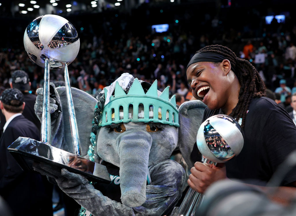 Jonquel Jones #35 of the New York Liberty celebrates with her MVP trophy after Game Five of the WNBA Finals against the Minnesota Lynx at Barclays Center on October 20, 2024 in the Brooklyn borough of New York City. 