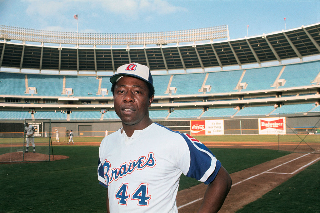 This is a waist-up portrait of Hank Aaron of the Atlanta Braves baseball team in uniform.