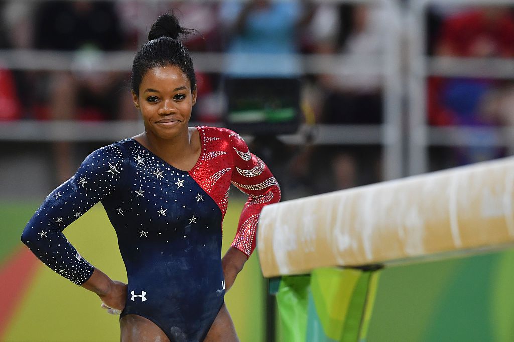 US gymnast Gabrielle Douglas prepares to compete in the qualifying for the women's Beam event of the Artistic Gymnastics at the Olympic Arena during the Rio 2016 Olympic Games in Rio de Janeiro