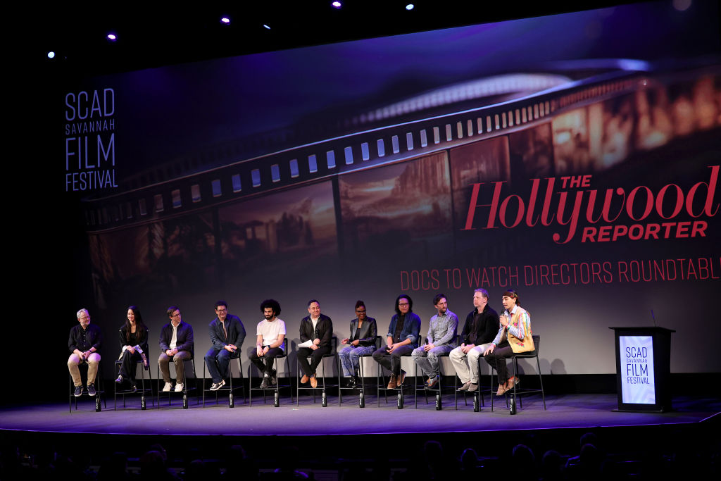 Morgan Neville, Shiori Ito, Josh Greenbaum, Peter Ettedgui, Ibrahim Nash’at, Scott Feinberg, Angela Patton, Stephen Maing, Brendan Bellomo, Matt Tyrnauer, and Julian Brave NoiseCat speak onstage at the Docs To Watch: Directors Roundtable during the 27th SCAD Savannah Film Festival on October 30, 2024 in Savannah, Georgia.