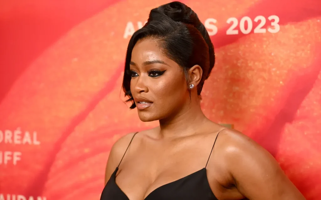 Keke Palmer wearing a french roll hairstyle